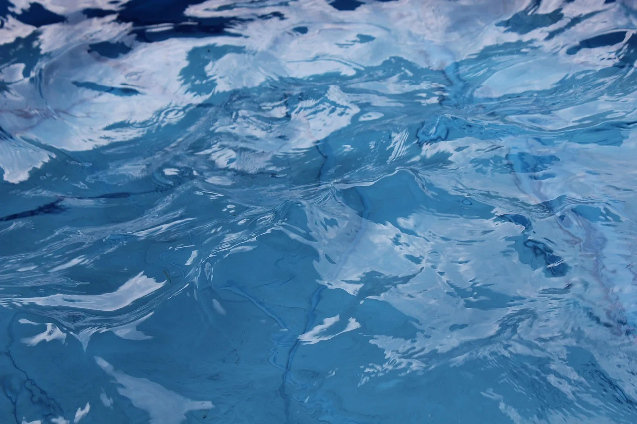 Solar pool heating system for a swimming pool